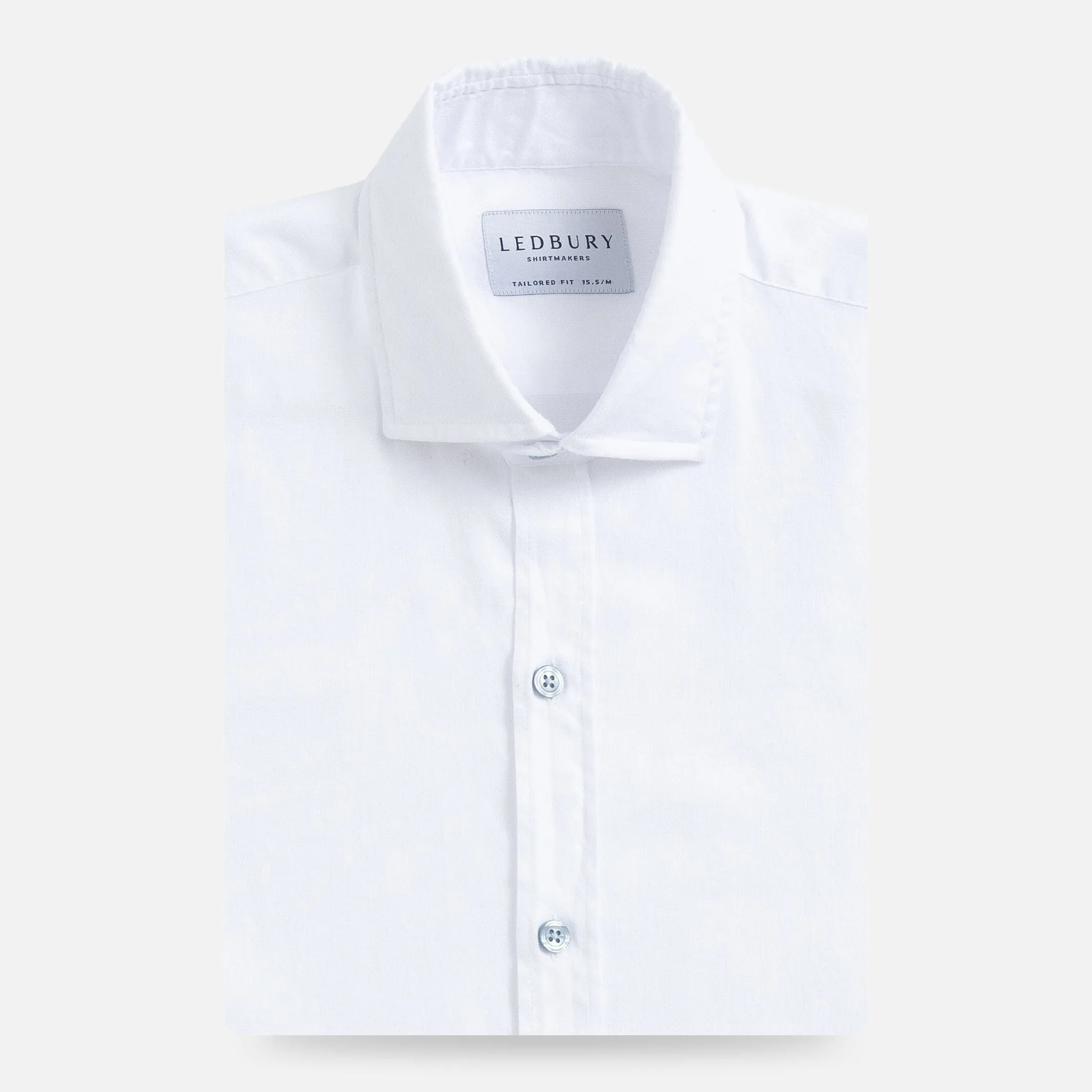 The White Asbury Oxford Soft Shirt with Blue Buttons